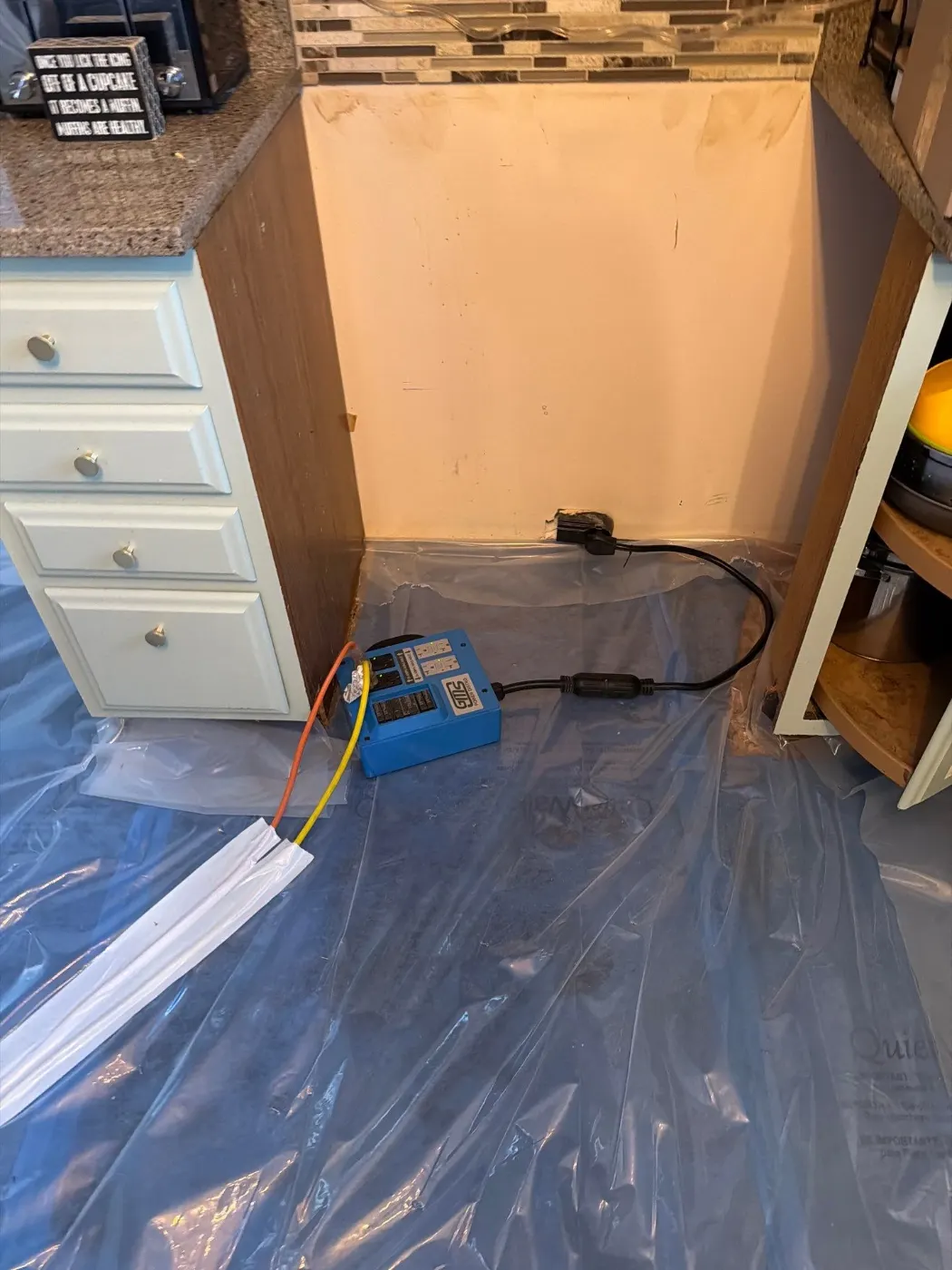Moisture meter reading on drywall in Pebble Brook water loss